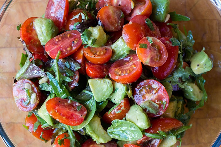 the salad tossed in the bowl