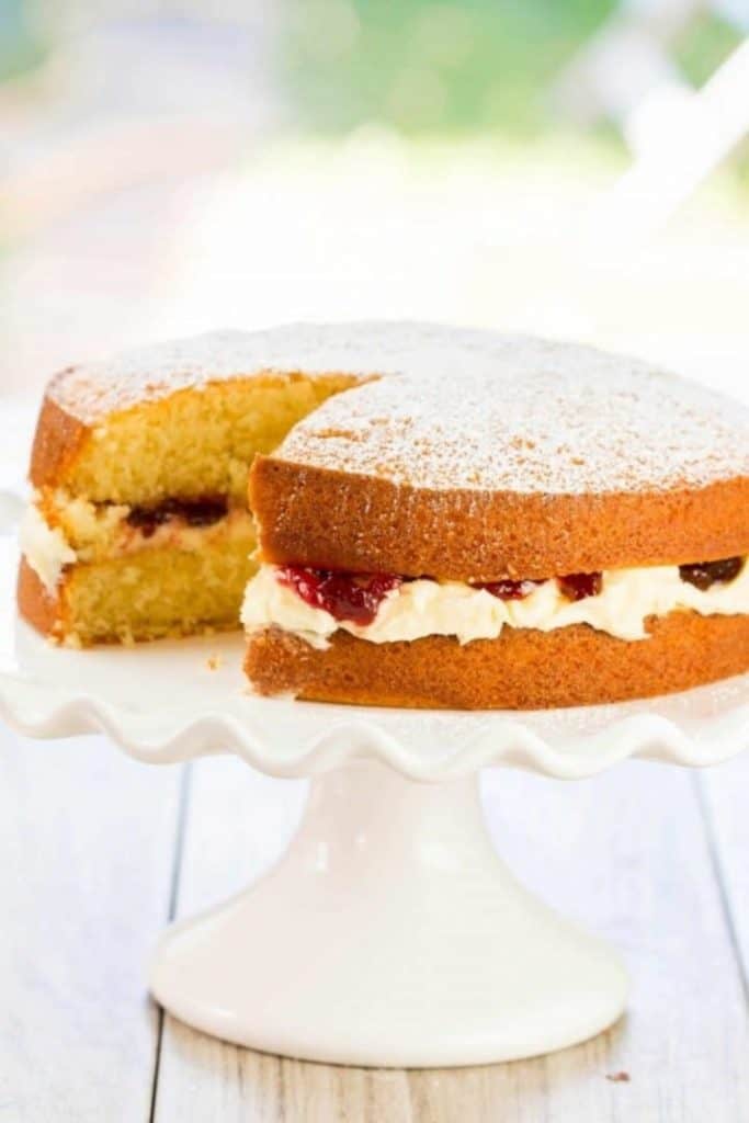 Victoria Sponge Cake with Buttercream with a slice taken out