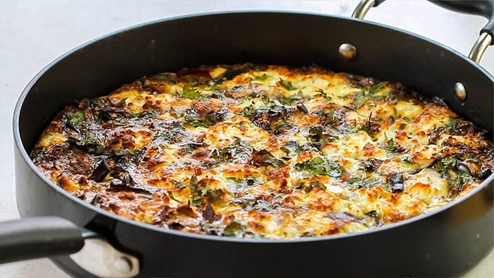 The Baked Eggplant Frittata with Red Onion, Peppers & Feta freshly baked in the pan