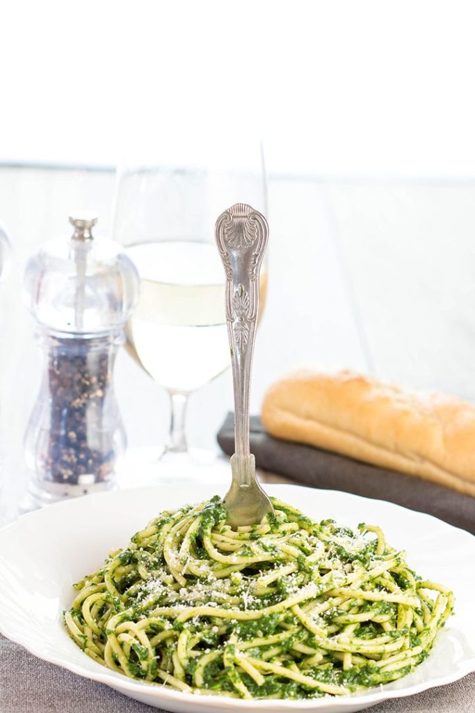 a plate full of Spaghetti with Spinach Sauce