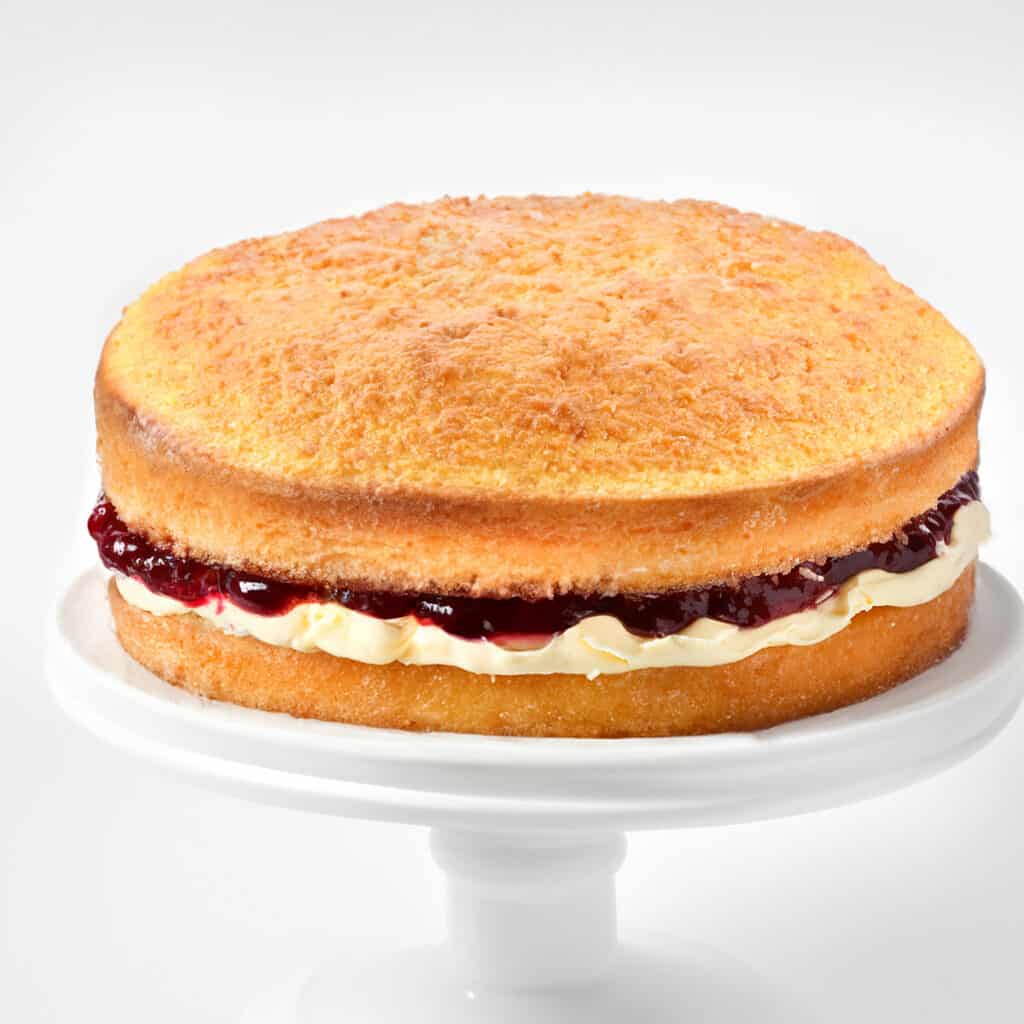 The top layer added to the Victoria Sponge Cake