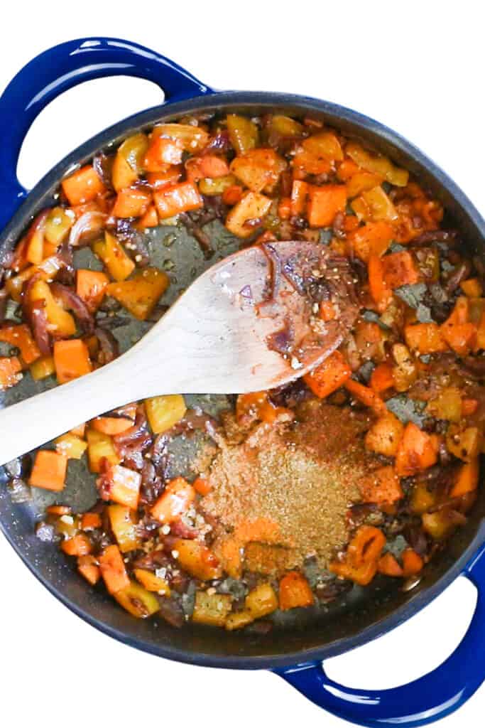 the spices added to the cooked vegetables in the pan