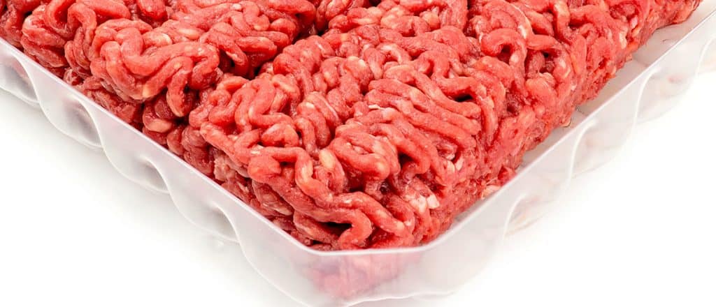 the corner of a pachage of raw ground beef