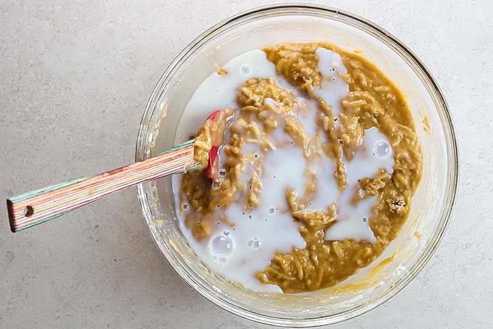 The milk added to the batter in the bowl