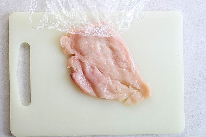 The chicken pounded to an even thickness