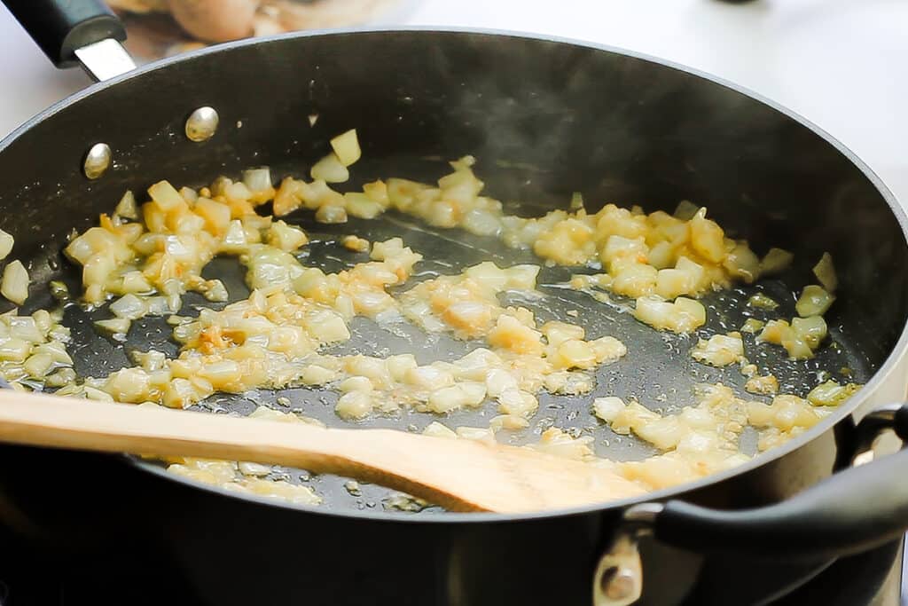 the onion and garlic cooking in butter in the pan.