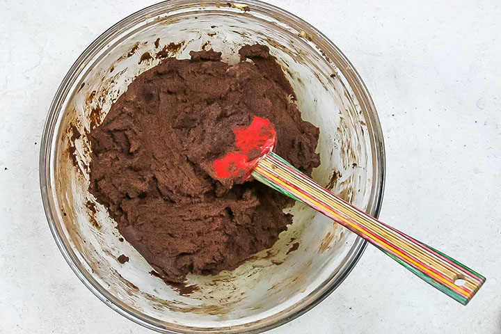 The cookie dough in a mixing bowl