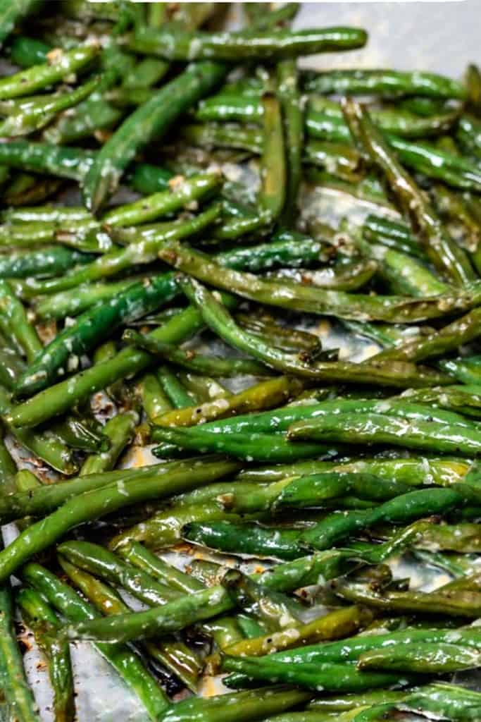 roasted green beans just out of the oven crispy and browned