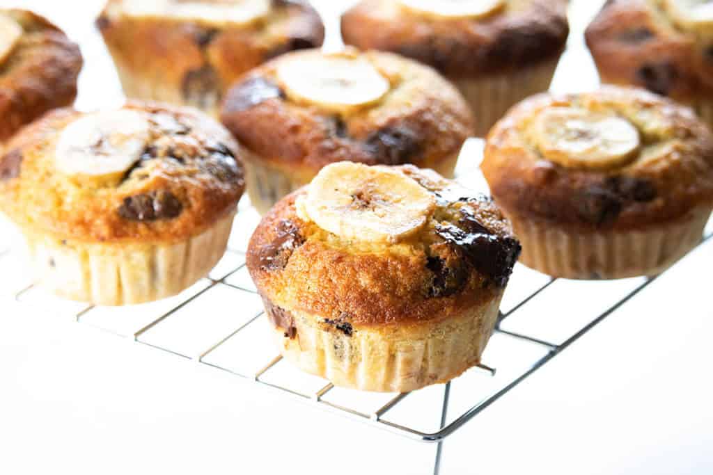 chocolate chip banana muffins cooling on a cooling rack