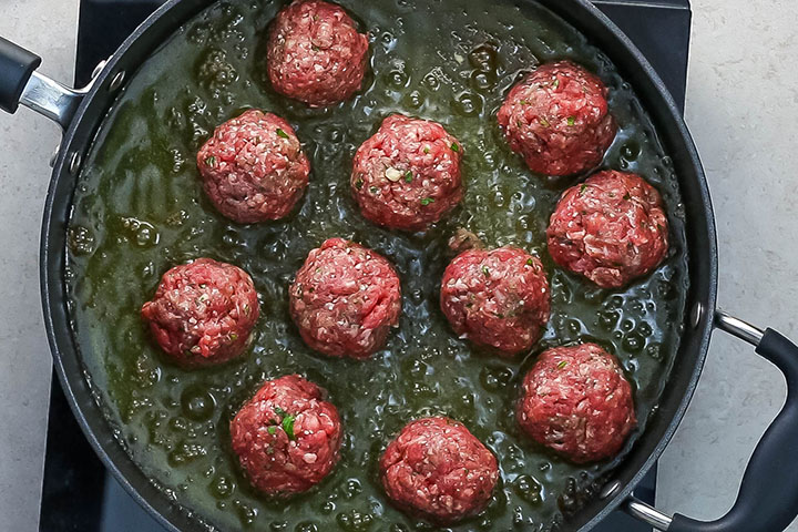 Meatballs frying in oil 