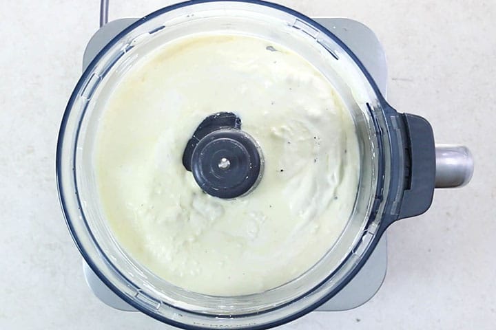 The topping mixture combined and smooth in the food processor