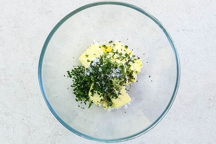 Chopped parsley and salt and pepper added to the butter and garlic