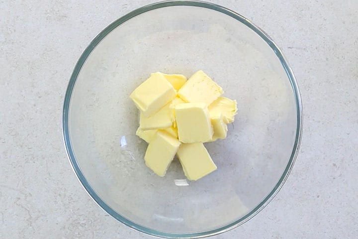 Softened butter in a bowl.