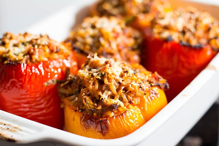 the stuffed peppers right out of the oven with golden tops