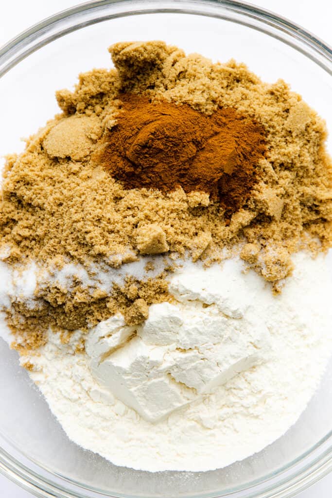 The dry ingredients of the Crumb Coffee Cake topping in a glass bowl