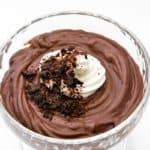 Homemade Dark chocolate pudding topped with shaved chocolate and whipped cream