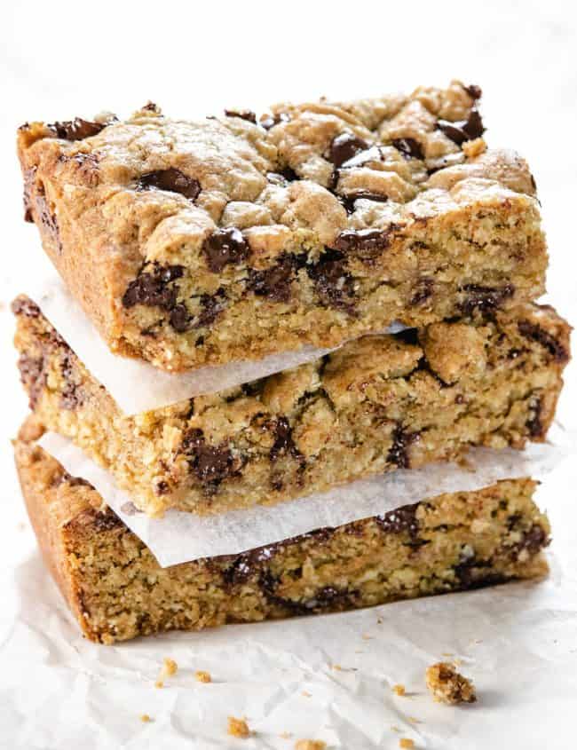 Three Chocolate Chip Oatmeal Cookie Bars stacked on top of each other.