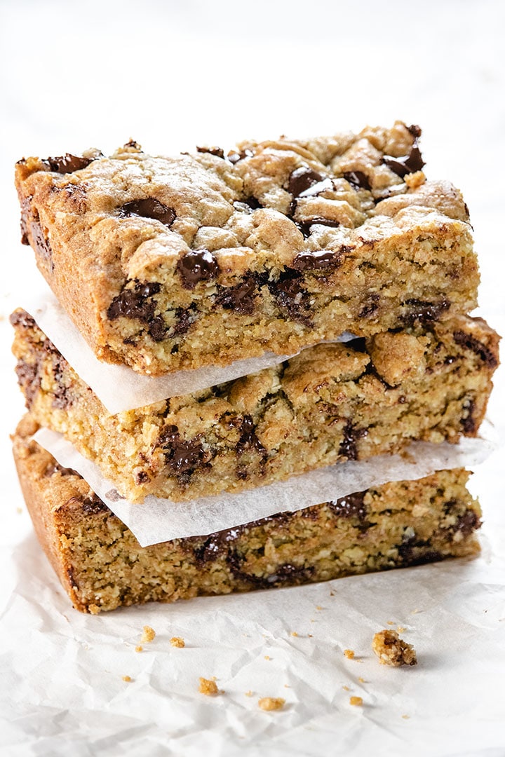 Three Chocolate Chip Oatmeal Cookie Bars stacked on top of each other.