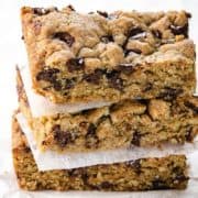 Three Chocolate Chip Oatmeal Cookie Bars stacked on top of each other.