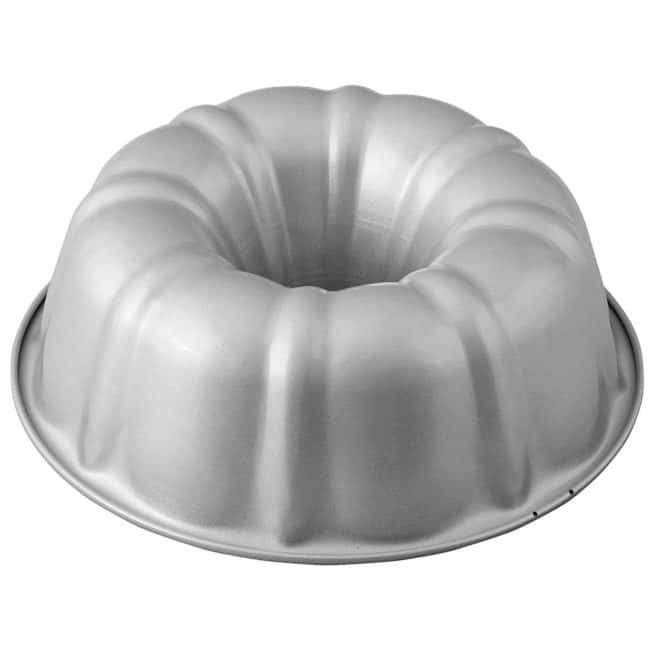 a silver wilton bundt pan with a white background