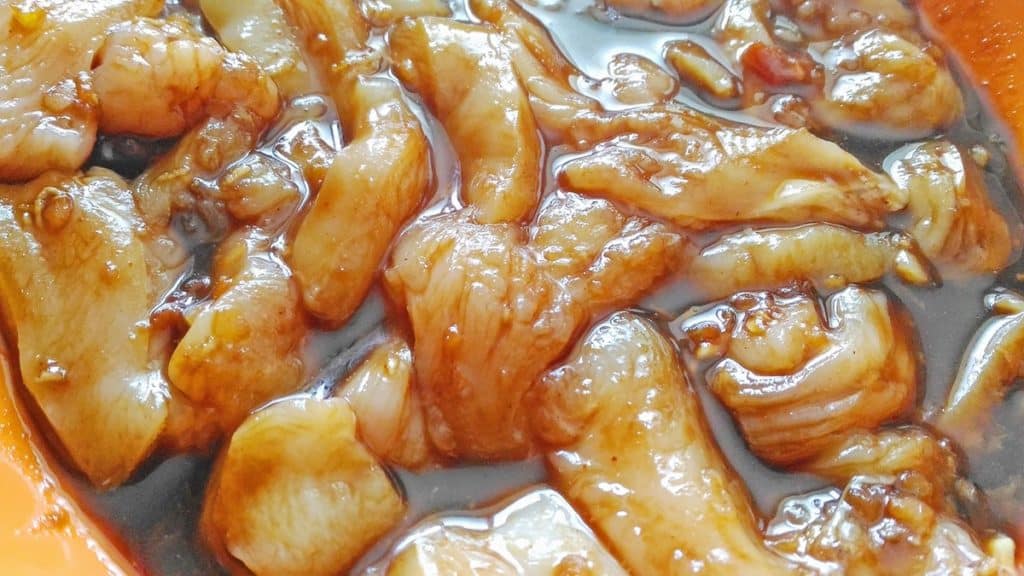 chicken meat marinating in sauce