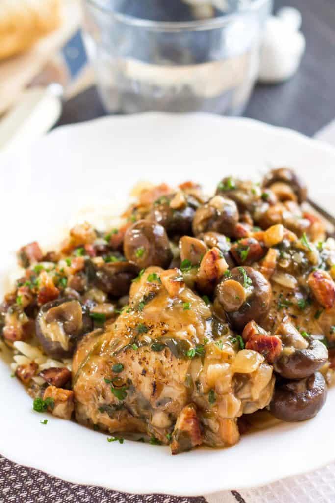 Chicken with Sherry Mushrooms Sauce piled high in a white bowl