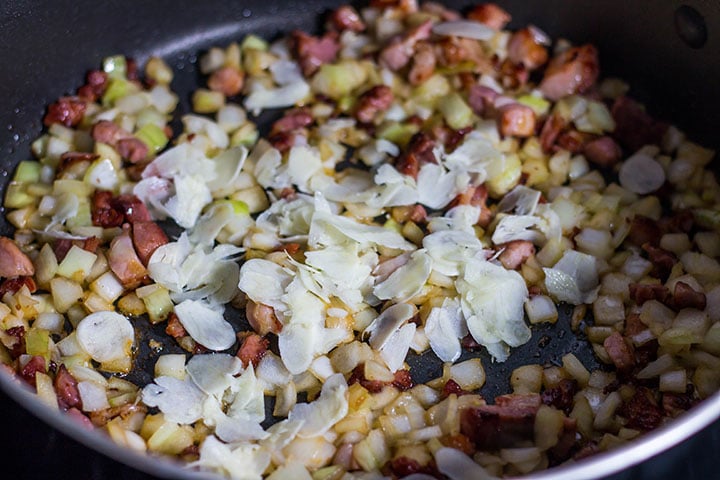 garlic added to the pan with the onion and pancetta