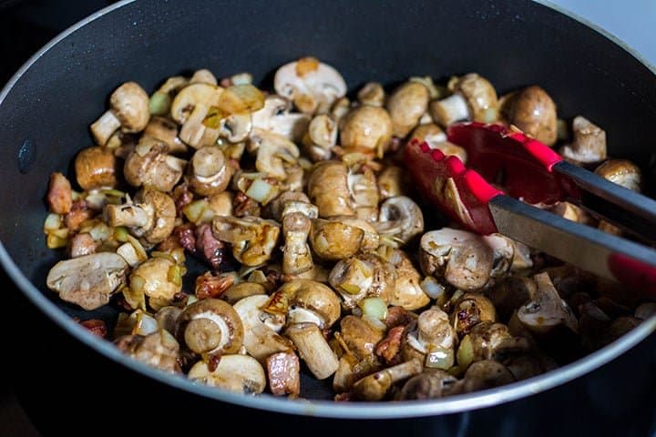 the mushrooms added to the pan with the pancetta mixture