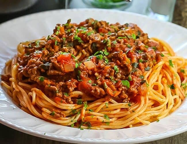 A close up photo of Quick & Easy Spaghetti Bolognese on a plate.