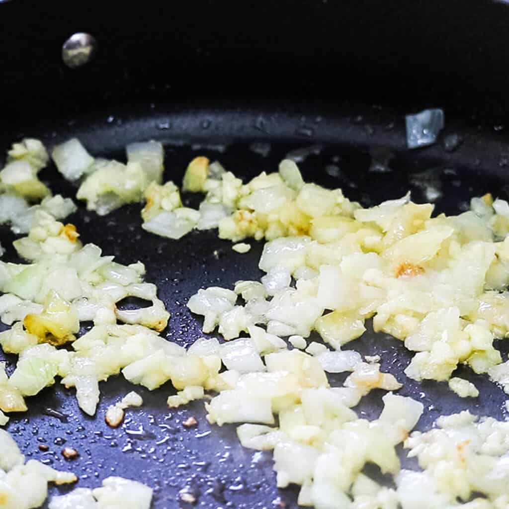 garlic and onions cooking in olive oil