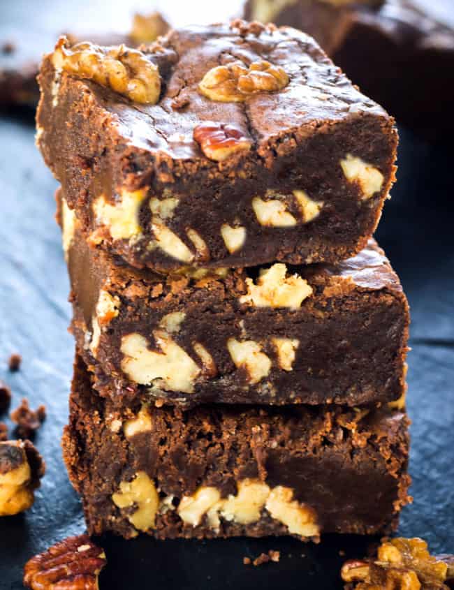 Three Nutty Homemade Brownies stacked on top of each other