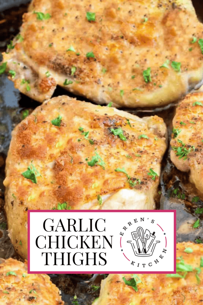 A promotional image showing the finished baked garlic chicken thighs topped with fresh parsley.
