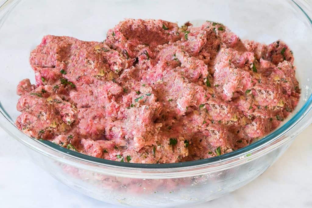 The combined meatball mixture in a bowl