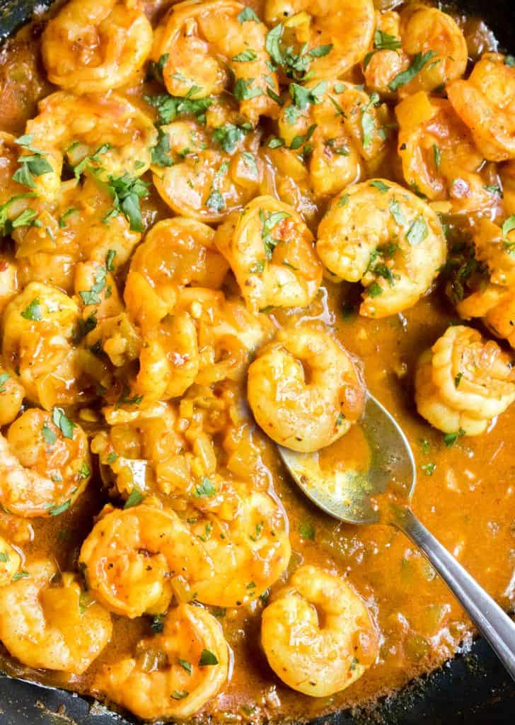 Shrimp Curry in the pan with a serving spoon ready to serve