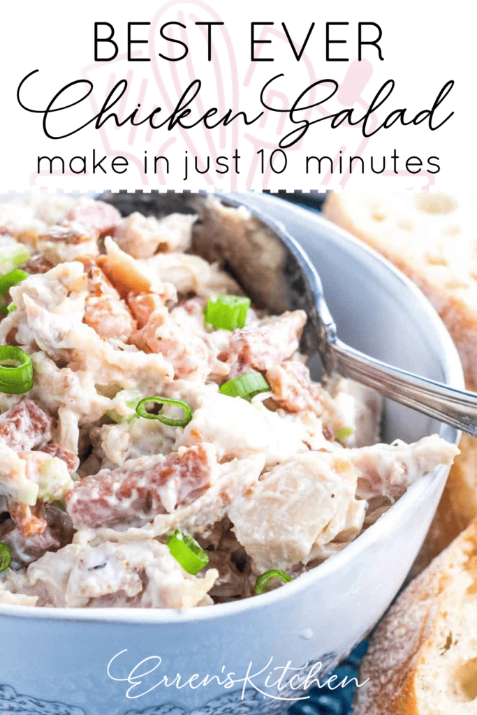 A bowl full of chicken salad with bacon, celery, and green onions.