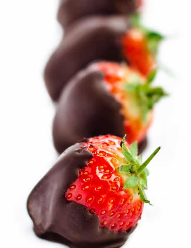 A close up of Strawberries covered in chocolate