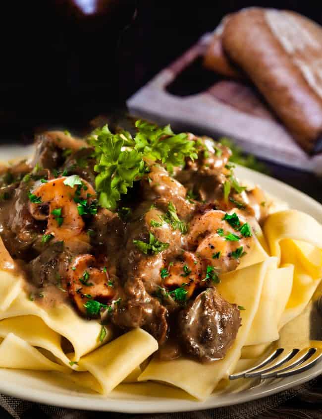 Beef and mushrooms in a creamy sauce over noodles