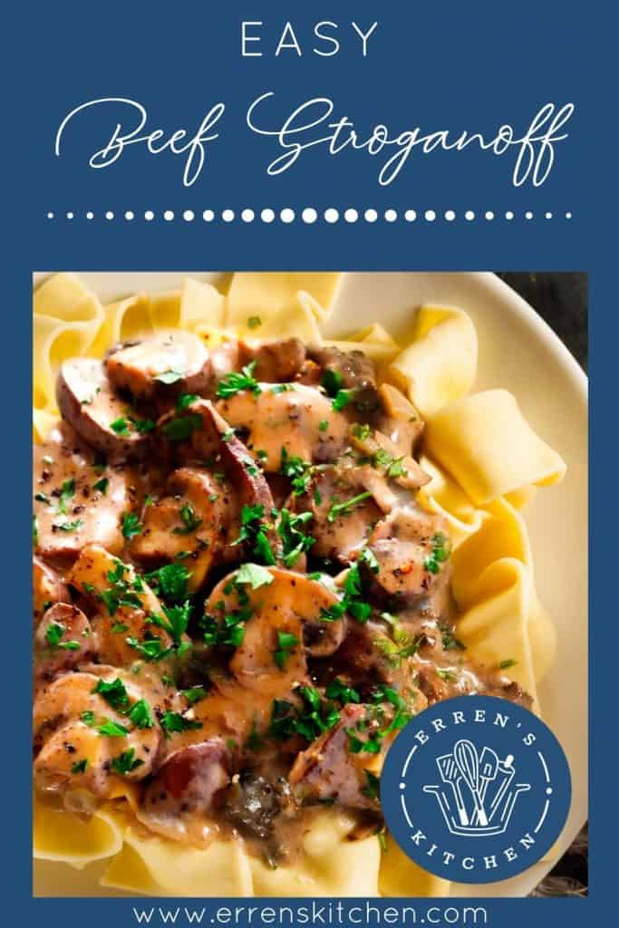 Beef and mushrooms in a creamy sauce over noodles with the words Easy Beef Stroganoff