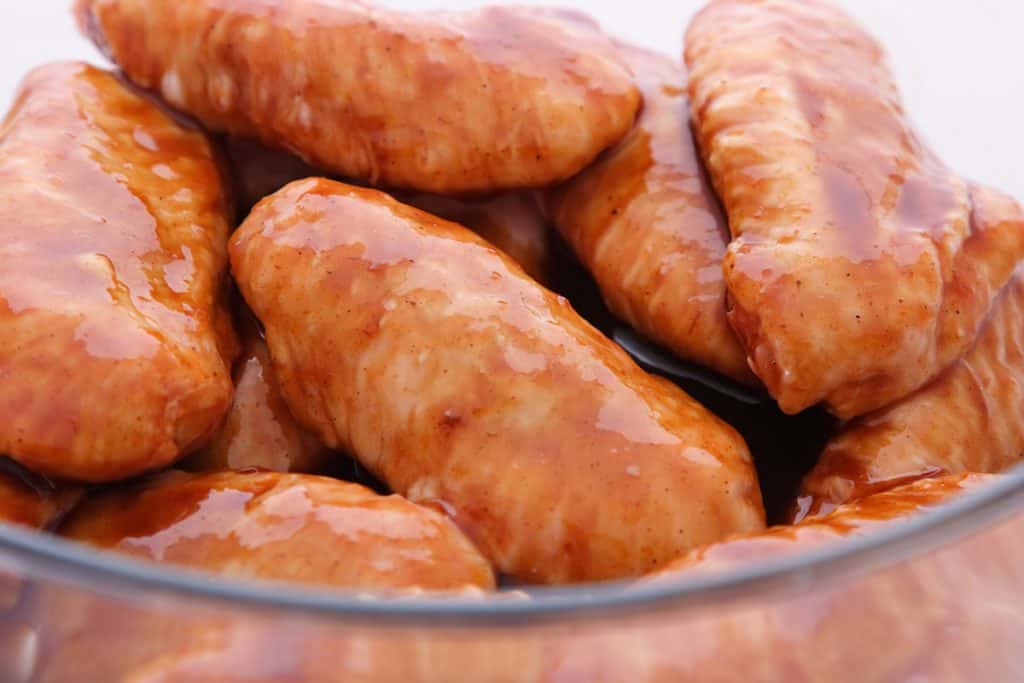 Chicken Wings in a bowl with theMarinade