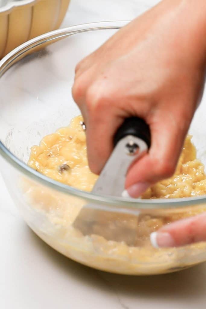 Mixing Banana Bread In Orange Bowl With Wooden Spoon Stock Photo, Picture  and Royalty Free Image. Image 8823227.