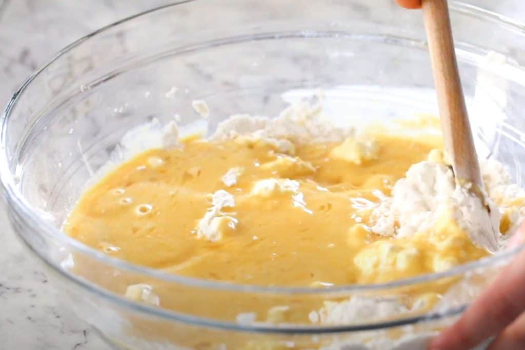 The wet ingredients added to the flour mixture