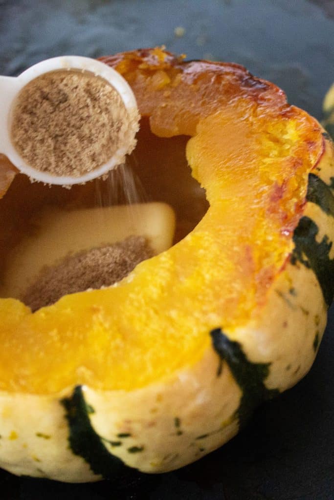 roasted squash with butter and brown sugar sprinkled on it