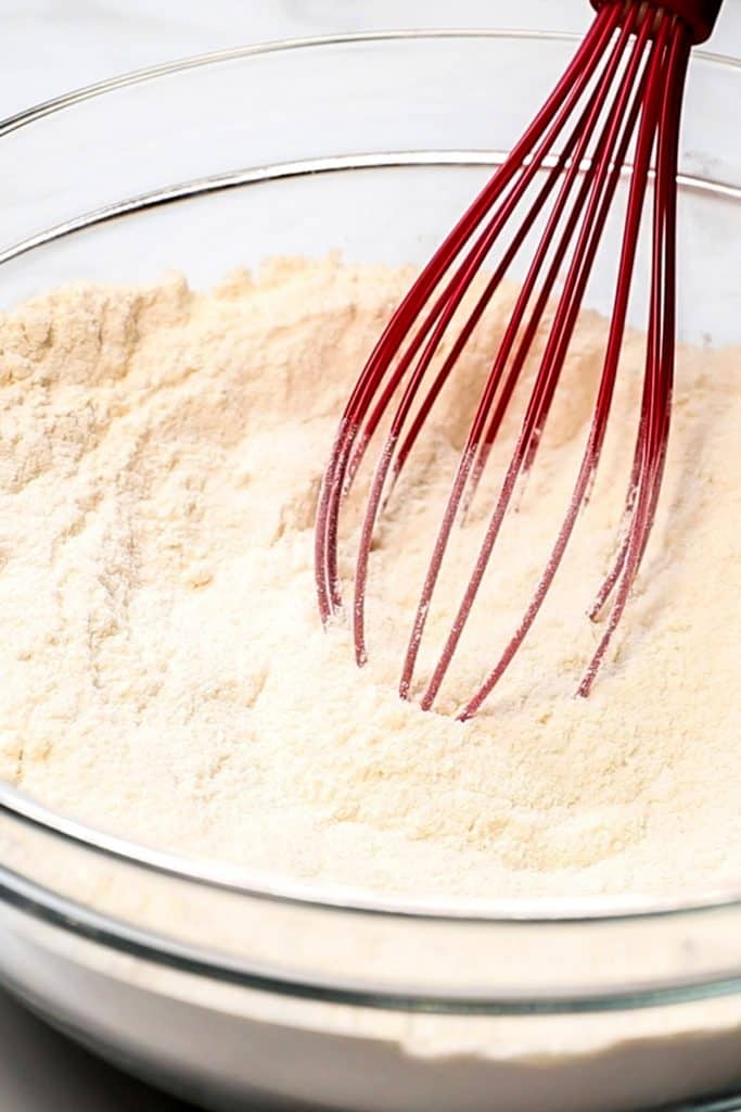 dry ingredients in a bowl with a whisk