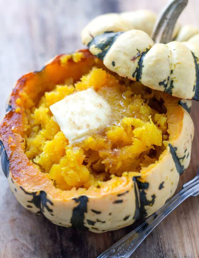 Mashed squash with butter in a squash shell