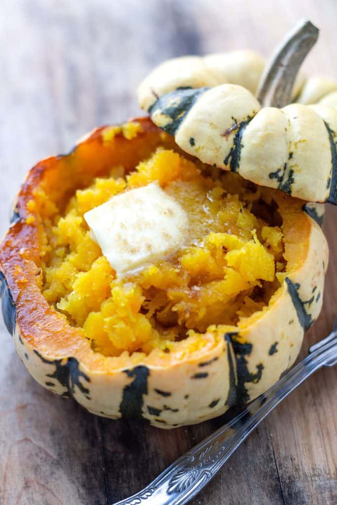 Mashed squash with butter in a squash shell