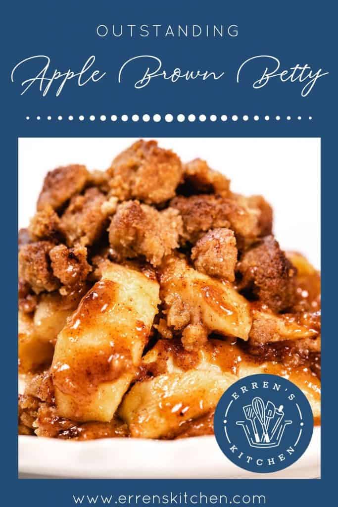 a dish piled high with baked Apples and crumb topping