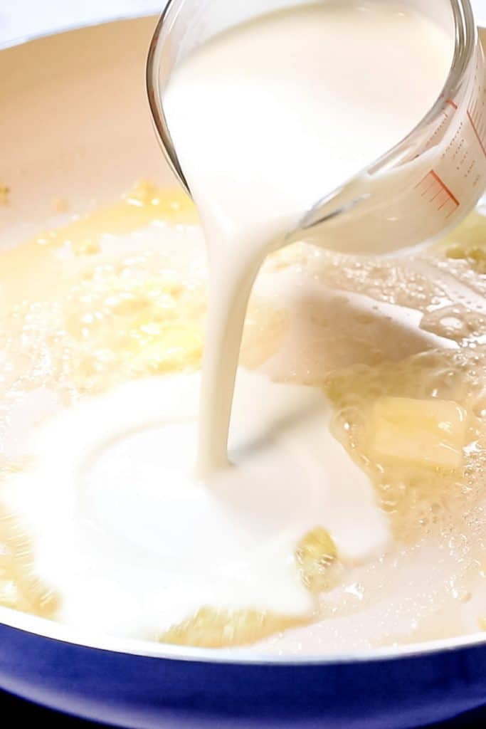 cream being poured into pan