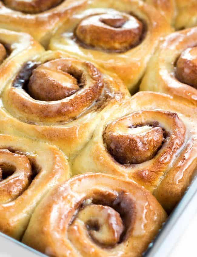 A pan of Cinnamon Rolls with a glaze on top