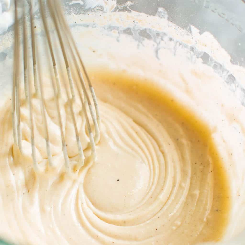 the cake batter mixed in a bowl