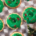 Christmas Wreath Cookies displayed on a silver tray.